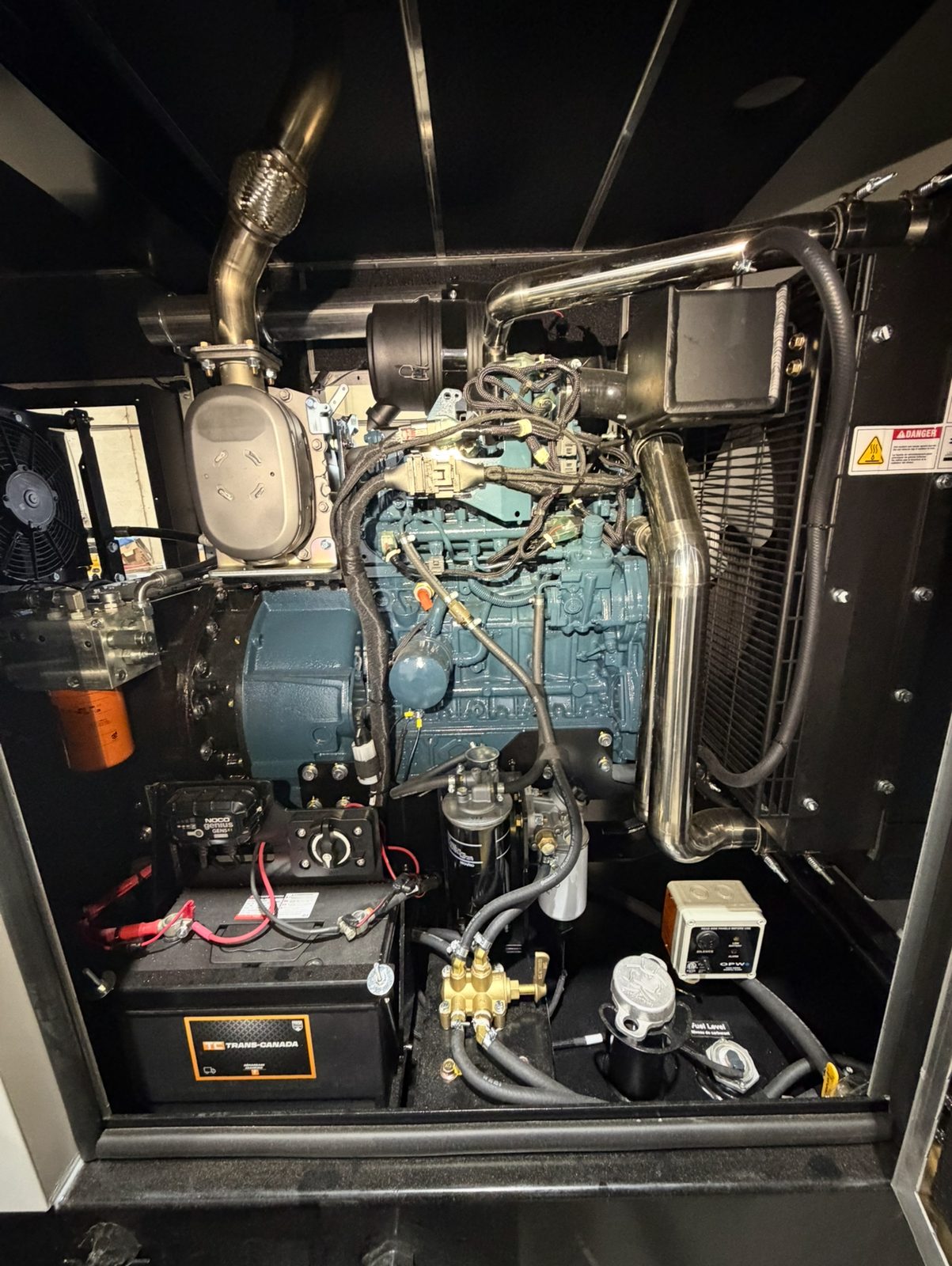 Serviced Kubota diesel generator inside its enclosure, maintained by M.I Generators